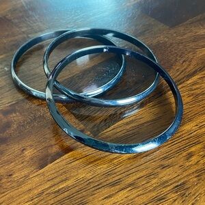 Set of Three Gunmetal Tone Metal Bangle Bracelets